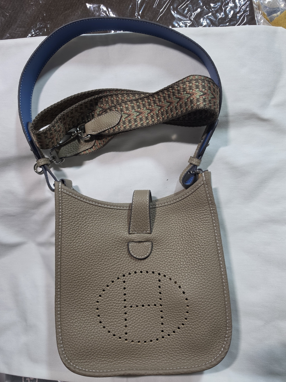 Taupe Pebbled Leather Handbag with Blue Strap and Woven Accent